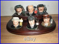 Complete set of Royal Doulton Sherlock Holmes Tiny Character Jugs on stand