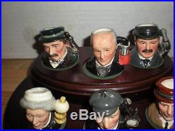 Complete set of Royal Doulton Sherlock Holmes Tiny Character Jugs on stand