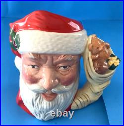 Lot of 2 Large Royal Doulton Christmas Holiday Santa Toby Jugs D6668, D6690 EUC