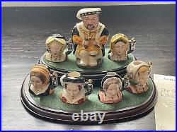 Mint Royal Doulton Henry VIII Toby Plus 6 Wives Set with Wooden Shelf Signed